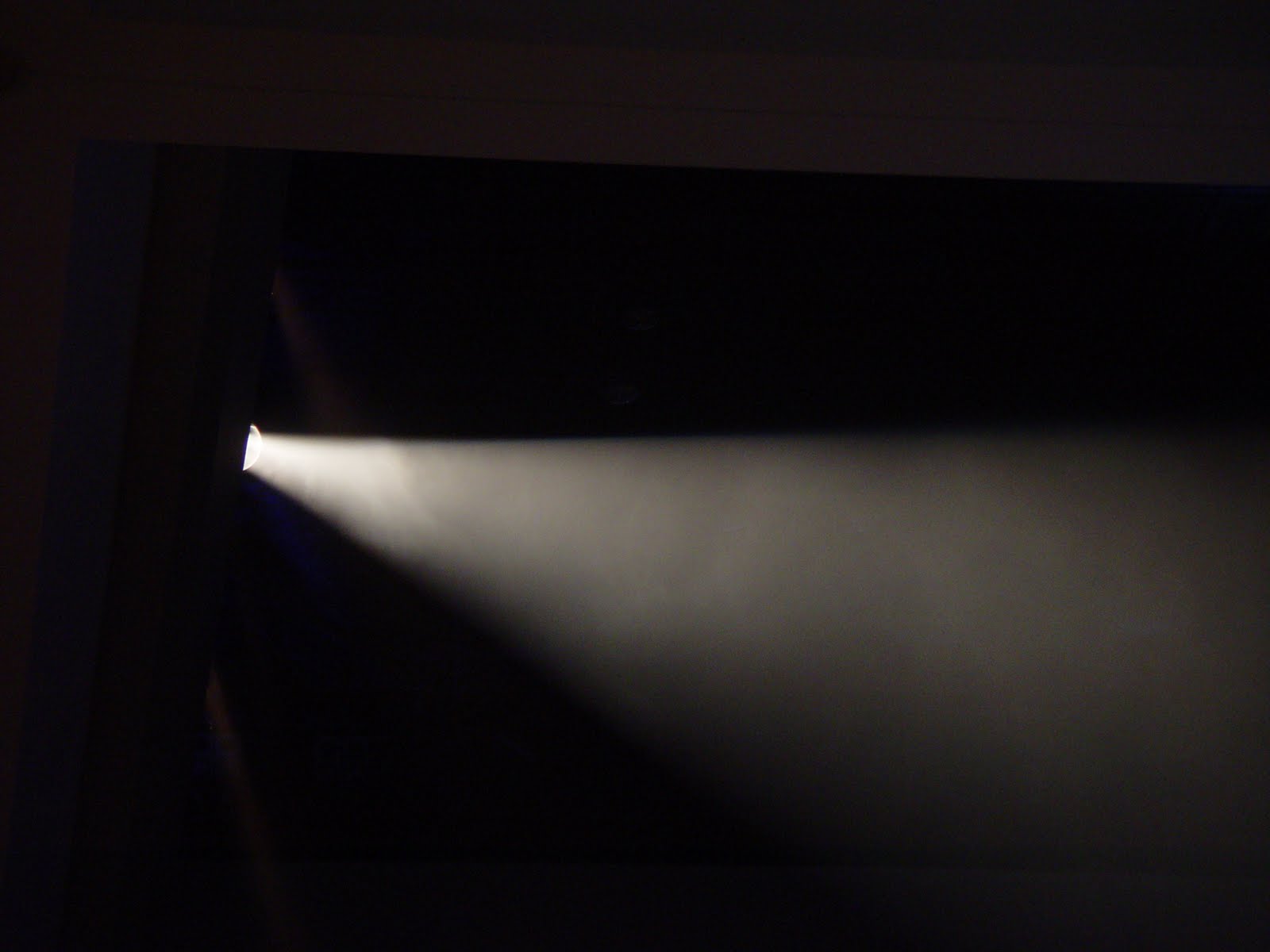 Image result for image of flashlight shining in dark